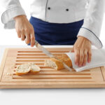 tabla de cortar pan con recogemigas