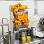 Exprimidor de citricos para cafeteria